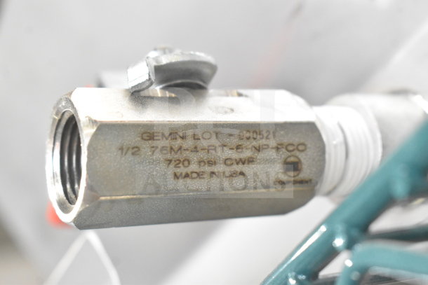 Valve marked "GEMINI LOT-090521," "1/2 76M-4-RT-6-NP-FCO," "720 PSI CWP," and "MADE IN USA." New, with visible scratches.