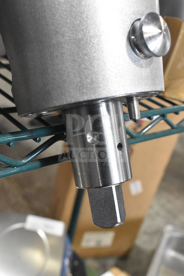 Brand new Avantco 190M22HSHRDR shredder attachment for mixers, fits #22 hubs, scratch and dent condition, metallic finish.