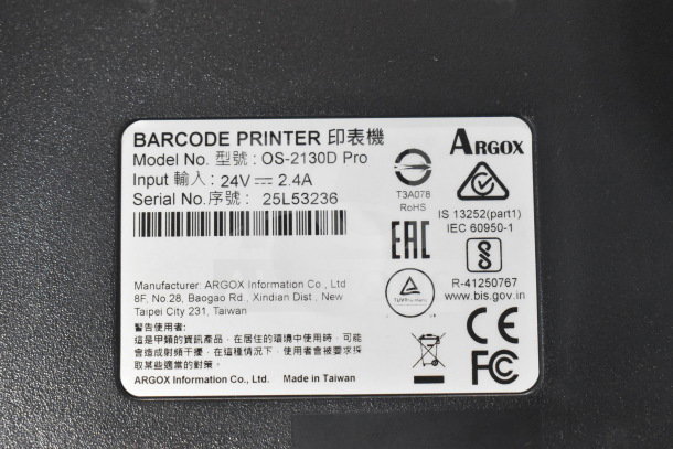 Brand new AvaTek OS-2130D Pro label printer with scratch and dent. Model number and certifications visible.
