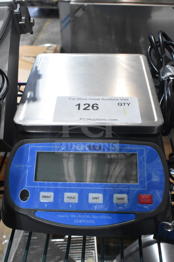 Brand new AvaTek 334PCN10 portion scale, 10 lb. capacity, legal for trade, scratch and dent condition, visible label.