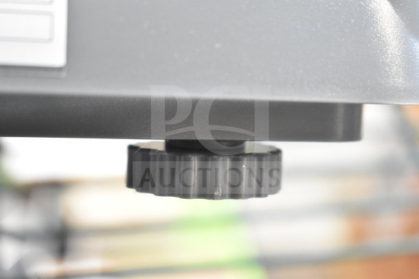 BRAND NEW AvaTek 334PCN10 10 lb. portion scale, scratch and dent condition, legal for trade, close-up of adjustment knob.