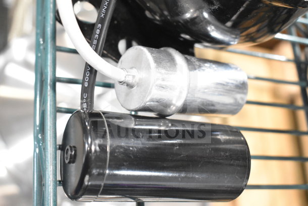 Brand new Avantco 17818103 compressor for AU and AWT series freezers; minor scratches. Markings show specifications.