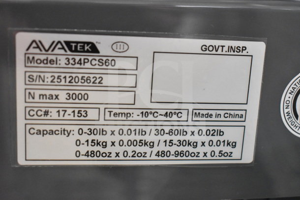 AvaTek 334PCS60 digital price computing scale, 60 lb. capacity, new condition. Label shows model, serial number, and specs.