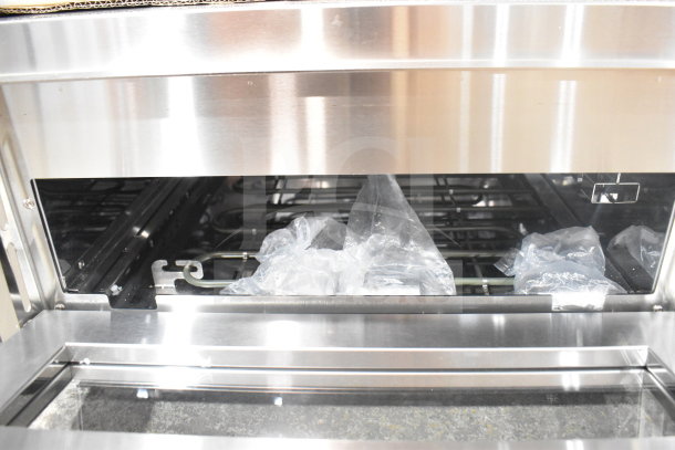 "Avantco 177DPO18S single deck countertop pizza oven, brand new, visible interior with protective plastic, 120 volts, 1 phase."