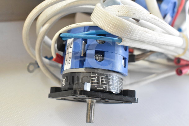 Brand new industrial switch with wires, model 236PMS14. Features blue and black components, lightly scratched.