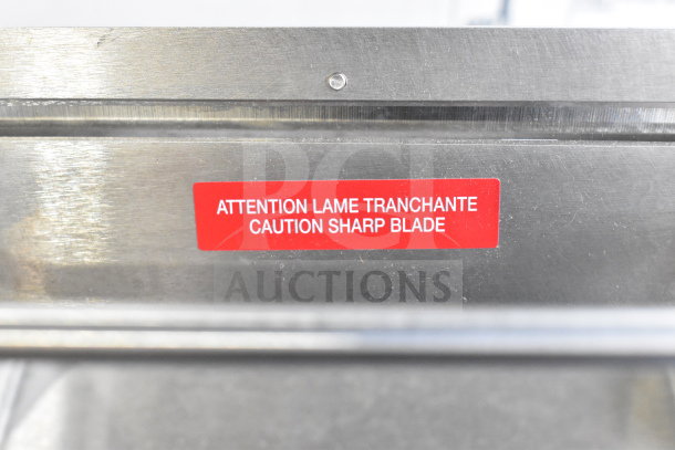 BRAND NEW Louis Tellier CLANX05 stainless steel slicer with sharp blade caution label; scratch and dent condition.