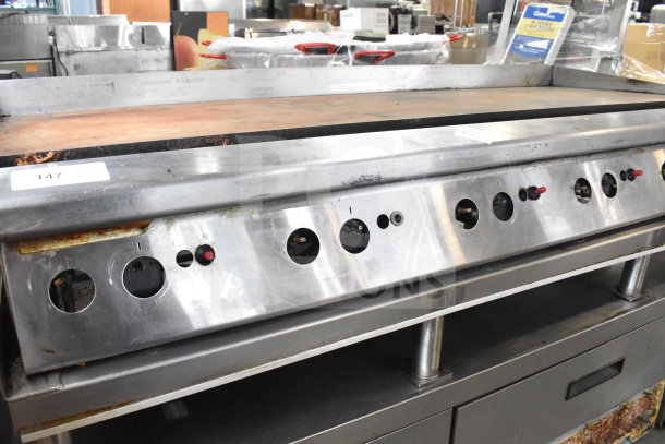 Garland Commercial Gas Griddle, countertop model, steel construction, visible wear, needs cleaning, numbered tag showing "147".