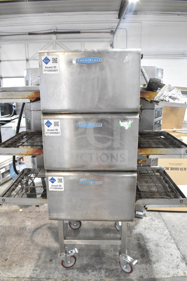 Turbochef HhC2020 commercial electric conveyor ovens on casters, includes equipment stand. 208/240V, 3-phase, asset tags visible.