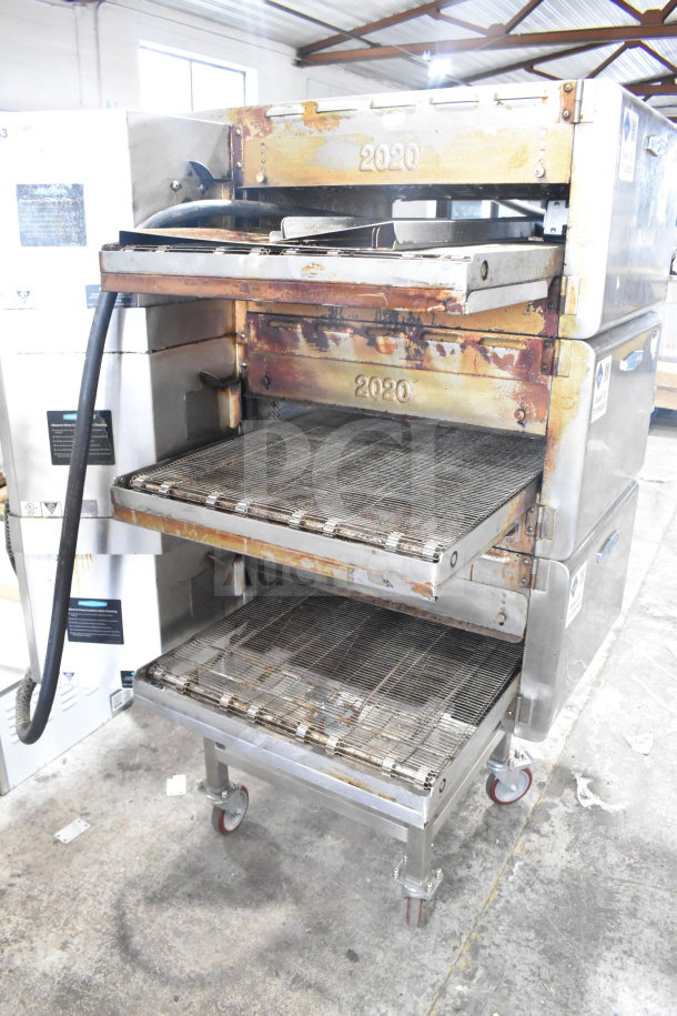 Turbochef HhC2020 commercial conveyor oven, electric-powered, with equipment stand, on casters. 208/240V, 3 Phase. Used condition.