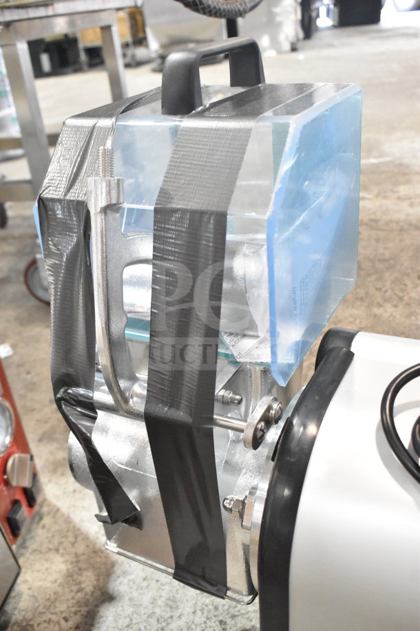 Brand new Sirman GF Dakota 20021608WNA electric cheese grater, scratch and dent, 120V, 1 phase, taped for protection.