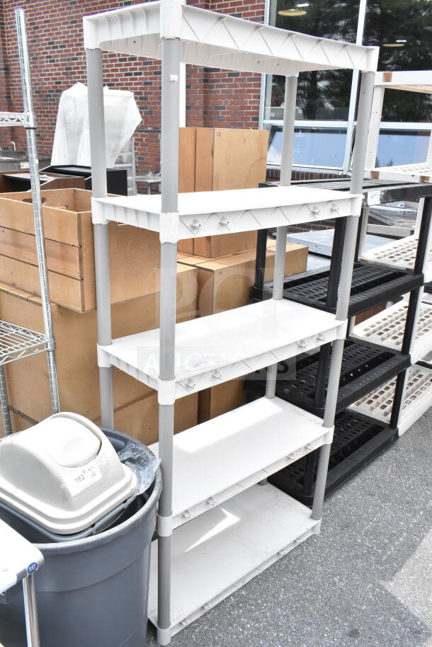 Tan Poly 5 Tier Shelving Unit, plastic construction, lightly used. Ideal for storage, showing minor wear on surfaces.