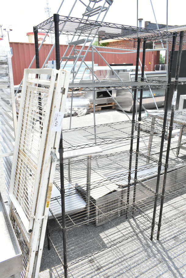 Black 6-tier wire shelving unit, metallic structure, fair condition, dismantling required by buyer, freight charges apply.