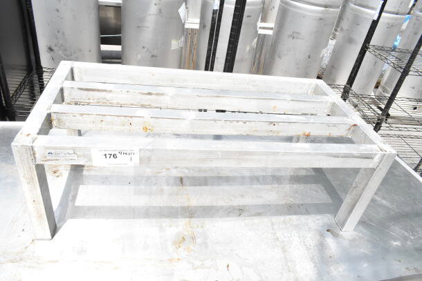 Commercial Dunnage Rack, metal frame, used condition with visible wear, labeled "Quar-a-Tech," auction tag 176 present.