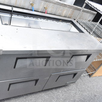 True commercial prep table with four drawers, missing top. Features 115 volts, 1 phase. Used condition.