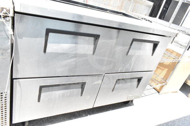 True Commercial Prep Table with 4 drawers, missing top. 115 volts, 1 phase. Stainless steel finish, used condition.