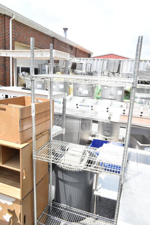Chrome finish 3 tier wire shelving unit, in used condition. Buyer must dismantle. Freight charges apply.
