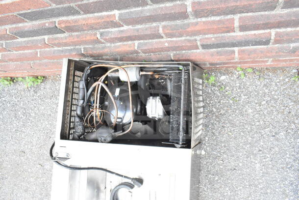 Commercial countertop refrigerated rail, 115 volts, 1 phase. Missing lid, visible wiring and compressor components.