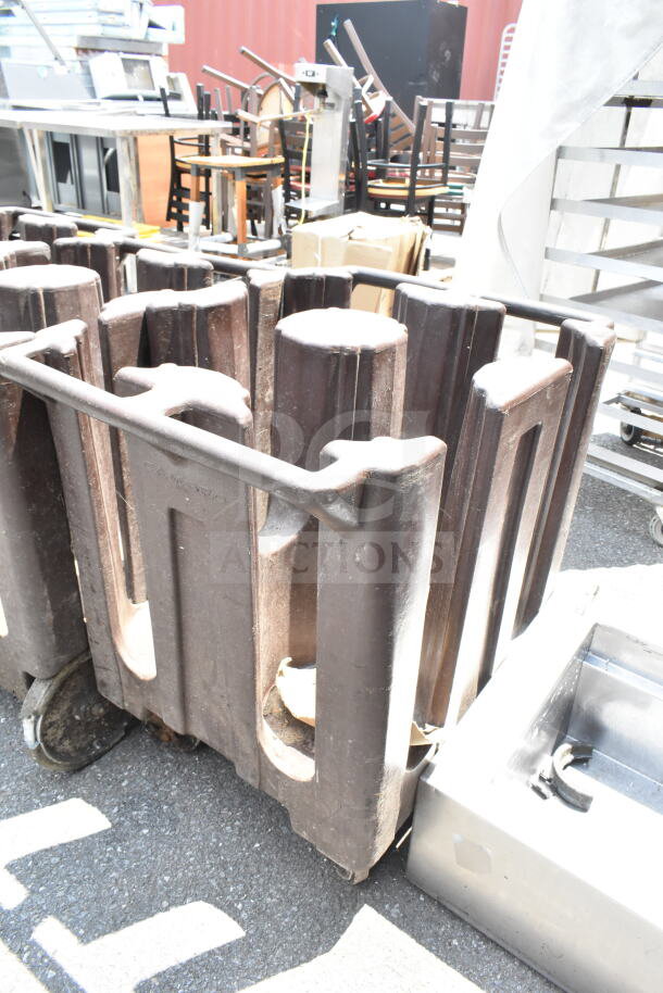 Three brown poly dish carts with commercial casters, used condition, label indicates Cambro brand.