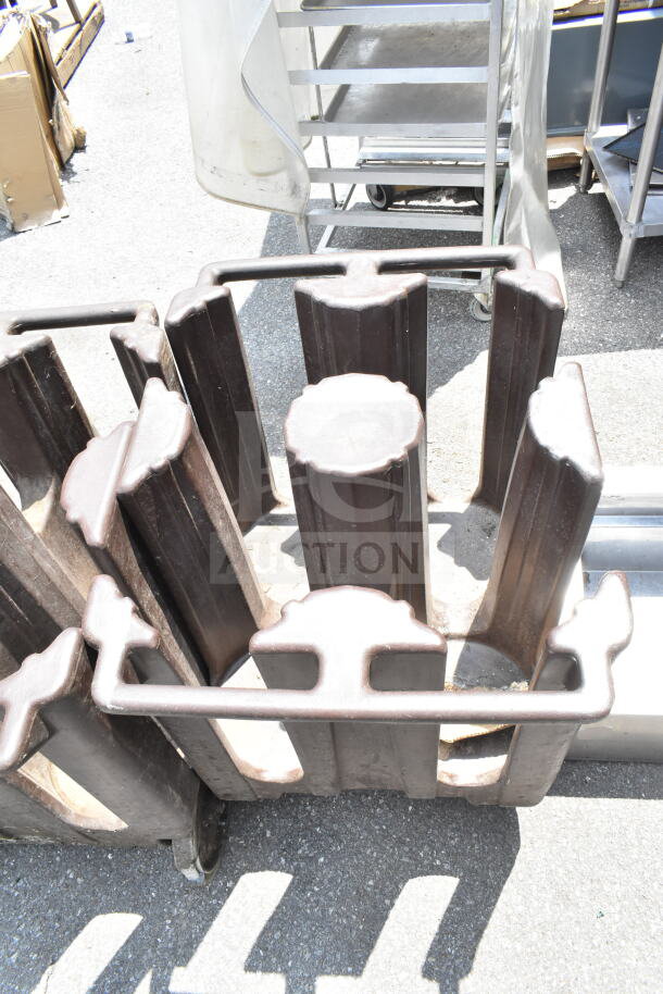 Three brown poly dish carts on commercial casters, sturdy design, suitable for restaurant use. Auction includes all three units.