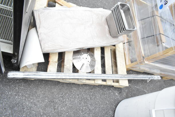 12 new scratch and dent items, including Lavex 44-gallon trash can (white, no lid), Regency cutting board insert, stainless steel bins.