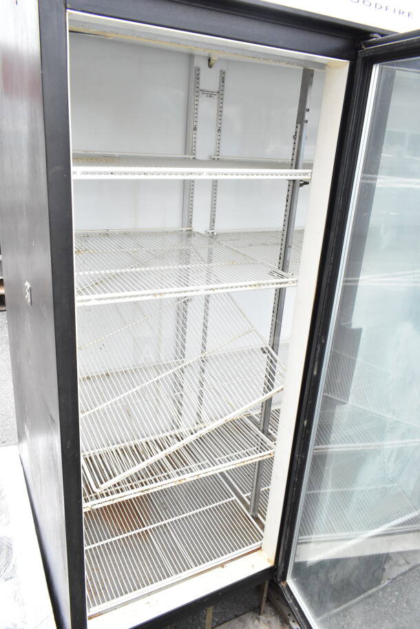 Beverage Air MT72 3-door reach-in cooler, white wire shelves, 115 volts, commercial use, worn exterior, needs cleaning.