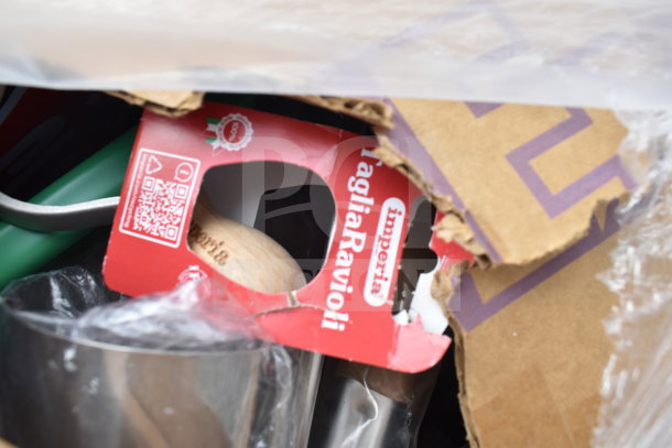 28 brand new scratch and dent items, including Imperia ravioli cutter packaging, pizza screen, portion spoon, pie pan.