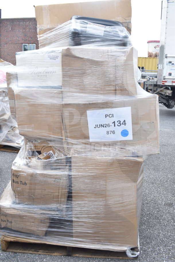 Pallet with 20 new items including a sink, glass rack, and food pan carrier. Some items marked "scratch and dent." Labels show "JUN26-134."