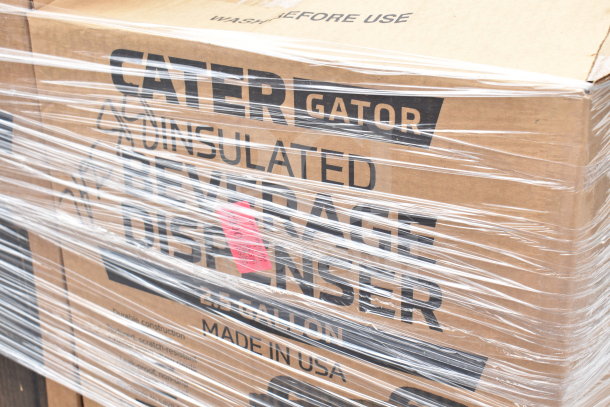 Bundle of 9 new CaterGator insulated beverage dispensers, scratch and dent condition, labeled "Made in USA", wrapped in plastic.