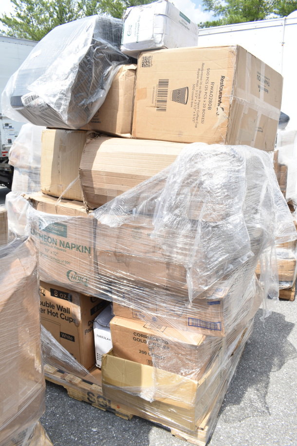 Palet of 26 brand new scratch and dent items, including boxes of cake circles, hot cups, food bags, and bamboo plates.