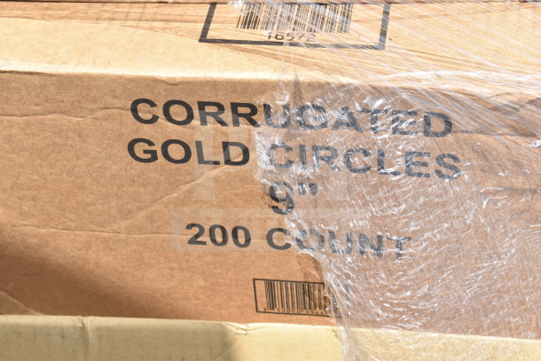 Cardboard box labeled "Corrugated Gold Circles 9'' 200 Count" partially wrapped in plastic. Brand new, scratch and dent condition.