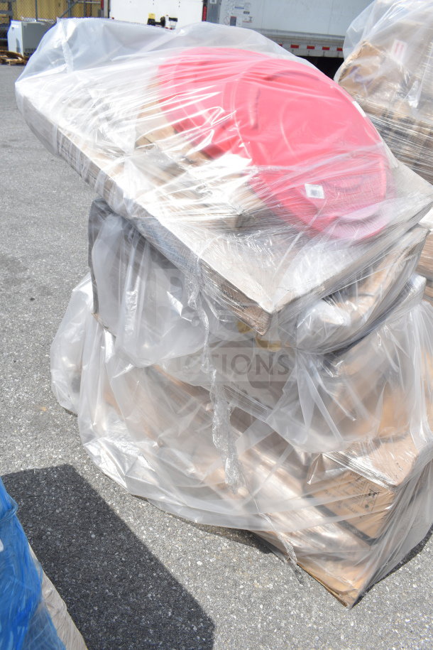 Plastic-wrapped pallet with solid wood tabletop and red trash can lids, brand new, scratch and dent condition.