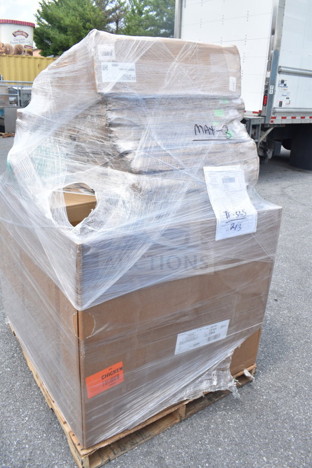 Pallet with 15 new scratch and dent items, including chairs, wrapped in plastic. Visible tags and labels for inventory.