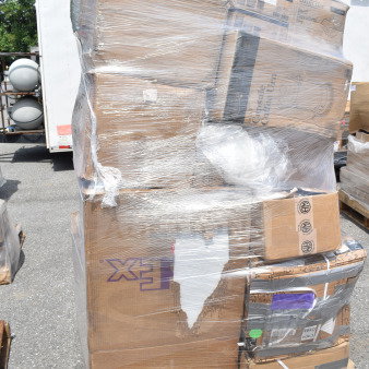 Pallet of 19 new scratch and dent items, including steam table pan, sediment tray, and wire shelf, in original packaging.