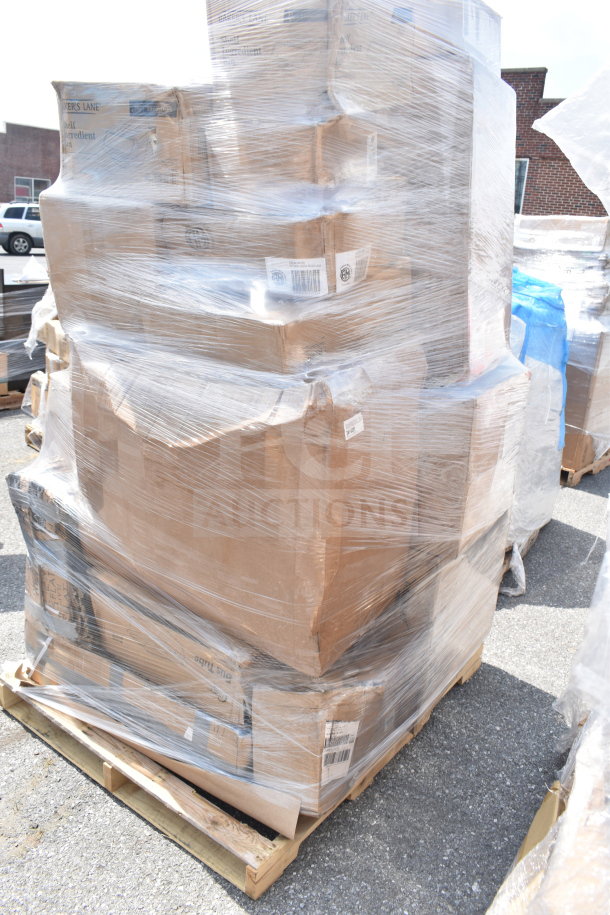 Pallet of 19 new items in boxes, wrapped in plastic, including steam table pan, sediment tray, and wire shelf.