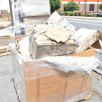 Large pallet of 8 new, scratch and dent items including compressor, hotel pans, and containers. Boxes wrapped in plastic.
