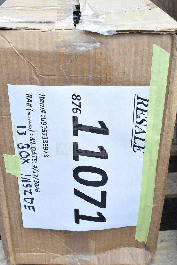 Cardboard box with a resale label, item number 11071, and RA# 6995733973, containing new scratch and dent items.