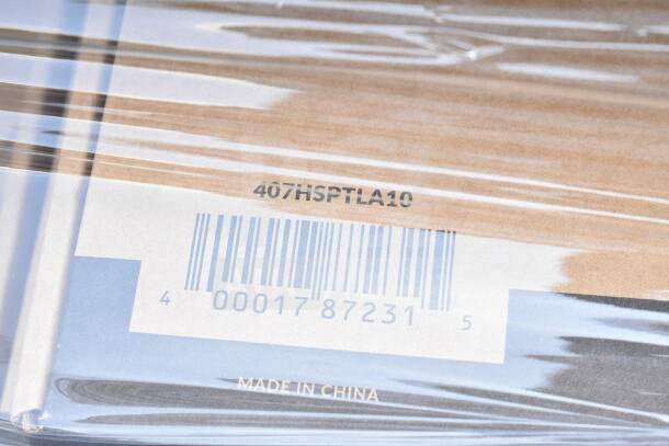 Brand new items labeled "407HSPTLA10," wrapped in plastic. Barcode and "Made in China" marking visible.