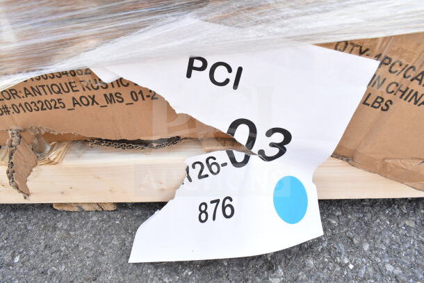 Torn label on packaging for "Antique Rustic" items, including table, speed rail, ice bin. Markings: PCI, MAY26-03.