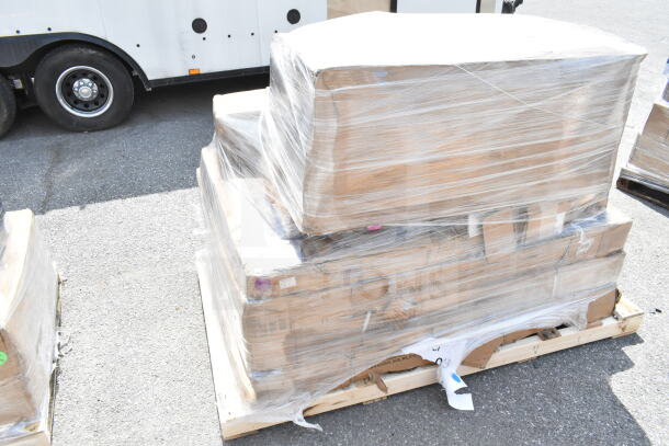 Stacked boxes on a pallet, wrapped in plastic, labeled "14 BRAND NEW SCRATCH AND DENT! Items."