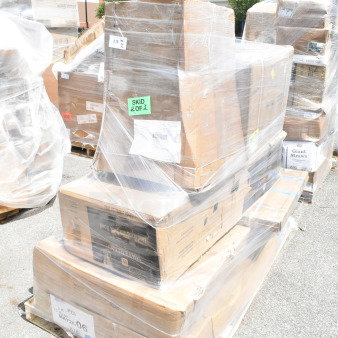Brand new scratch and dent items on pallet, including work table and sink. Skid marked "2 of 3." Visible labels and packaging.
