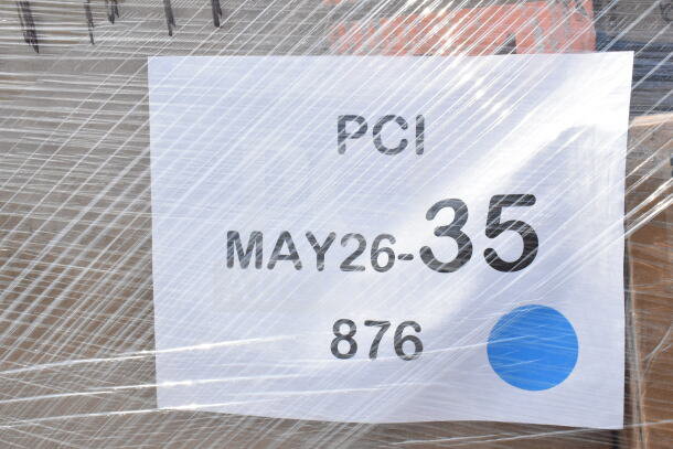 Packed pallet with label "PCI MAY26-35" indicating 29 brand-new scratch and dent items, including straws and containers.