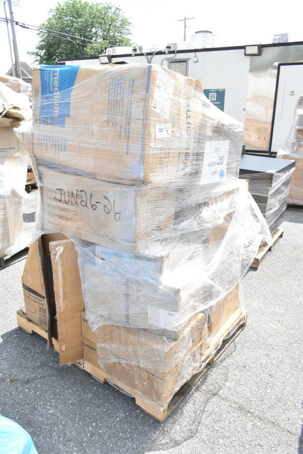 Pallet with 26 new scratch and dent items including utensils and pizza pans in sealed boxes, labeled JUN26-26.