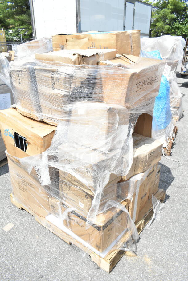 Pallet of 26 brand new scratch and dent items in boxes, including cutlery and pizza pans, wrapped in plastic. Marked with code JUN26-26.