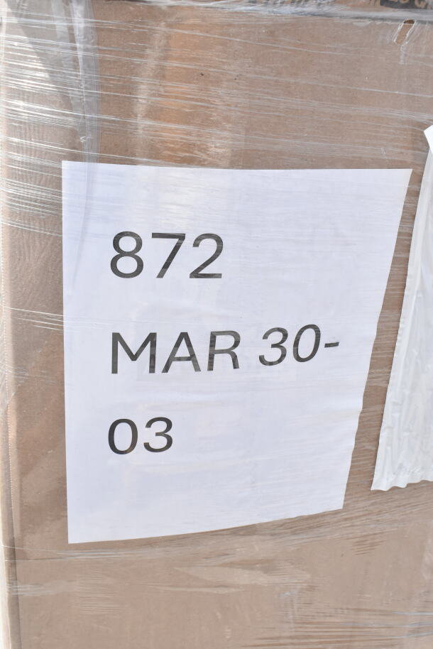 Pallet wrapped in plastic with a label showing "872 MAR 30-03," containing 16 new scratch and dent items like cups and bins.