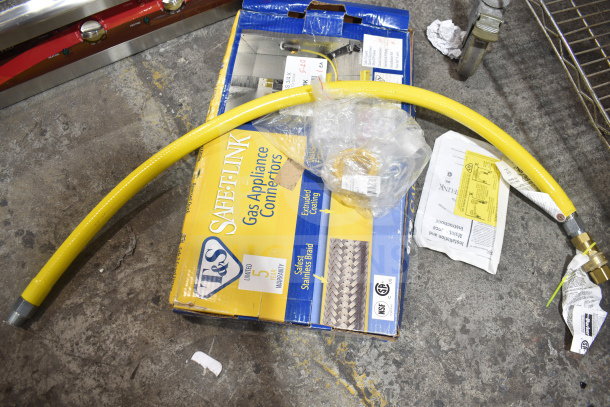 BRAND NEW SCRATCH AND DENT T&S Gas Hose, Safe-T-Link box, yellow hose, stainless braid, limited 5-year warranty.
