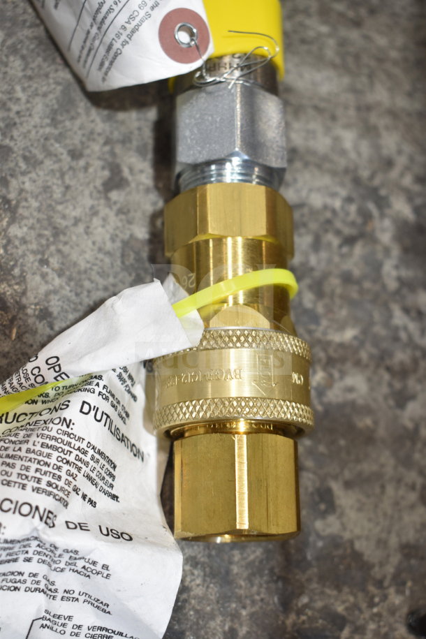 Brand new T&S gas hose with brass fittings, minor scratches. Tags indicate usage instructions.