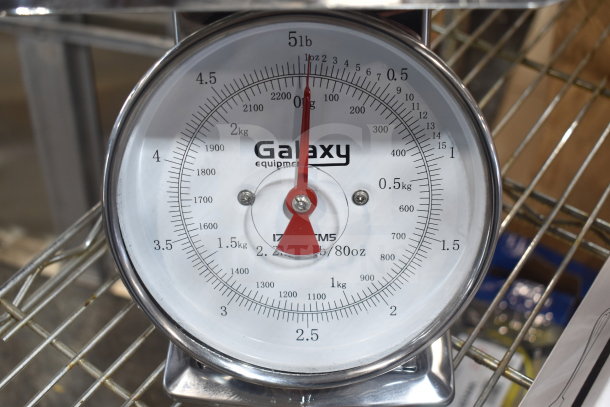 Brand new Galaxy 177GPCM5 5 lb. mechanical portion control scale; features stainless steel dial with dual measurements.