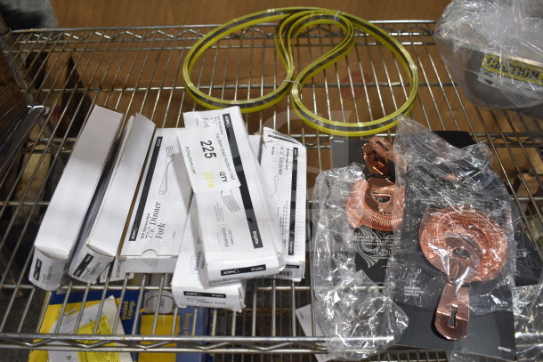10 new items including Barfly® M37026CP Copper-Plated Hawthorne Strainers and Acopa Brigitte Dinner Forks on a metal shelf.