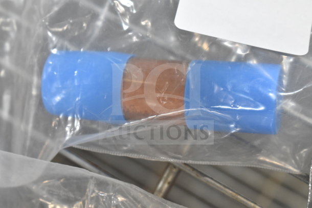 Package containing a brand new HP203126A Beverage-Air 203-126A Cap Tube with blue ends, in clear plastic wrap.