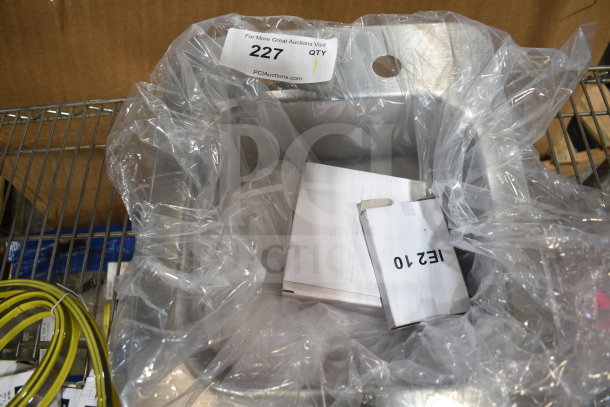 Brand new Regency 600DI1995 single-compartment sink, 9x9x5 inches, 18-gauge 304 stainless steel, with visible packaging.